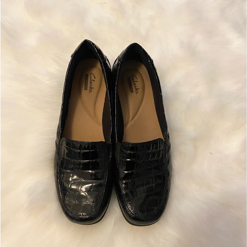 Clark’s black crocodile loafers